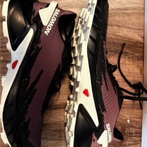 Salomon Black and Purple Athletic Shoes with Retro Design